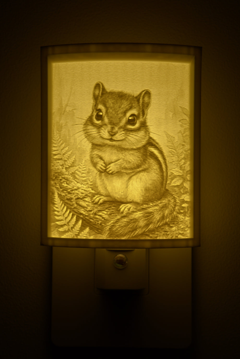 Close-up of the chipmunk design in warm light