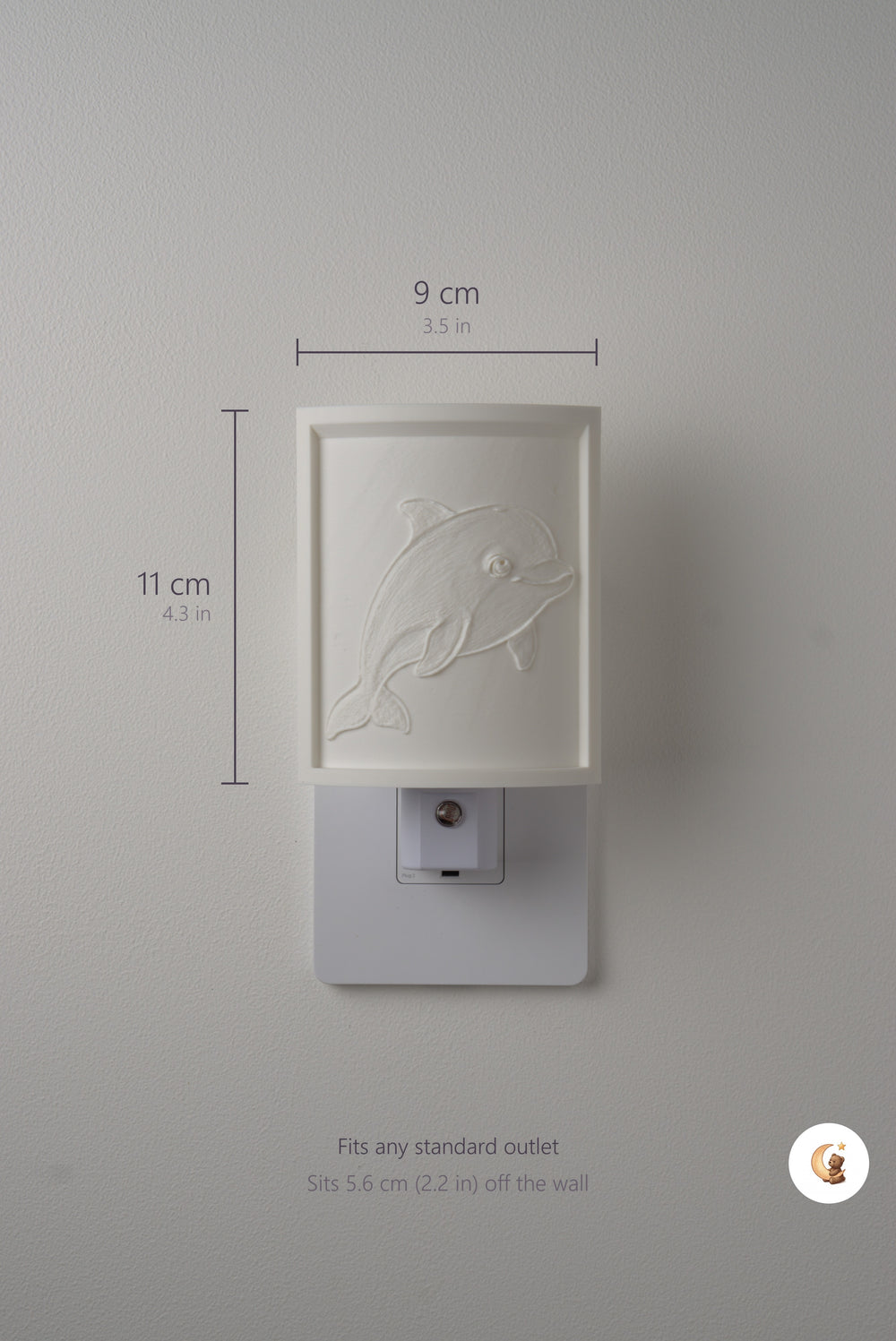Size guide: the Dolphin night light is 9 cm (3.5 in) wide by 11 cm (4.3 in) tall and fits any standard outlet