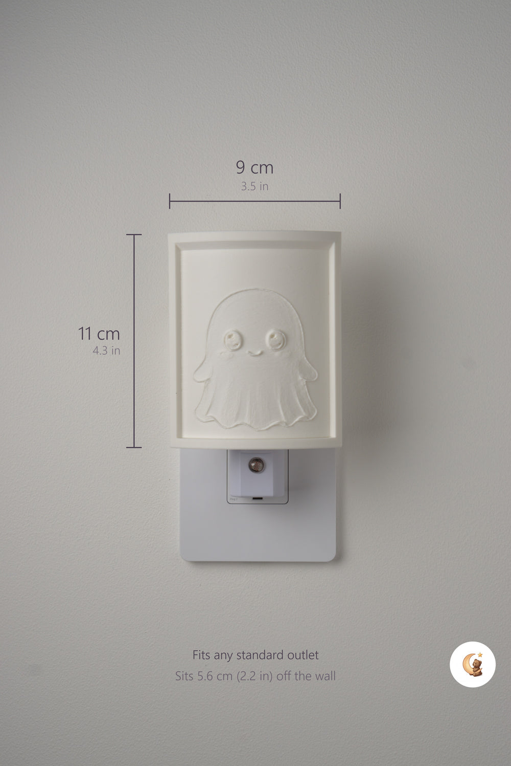 Size guide: the Ghost night light is 9 cm (3.5 in) wide by 11 cm (4.3 in) tall and fits any standard outlet