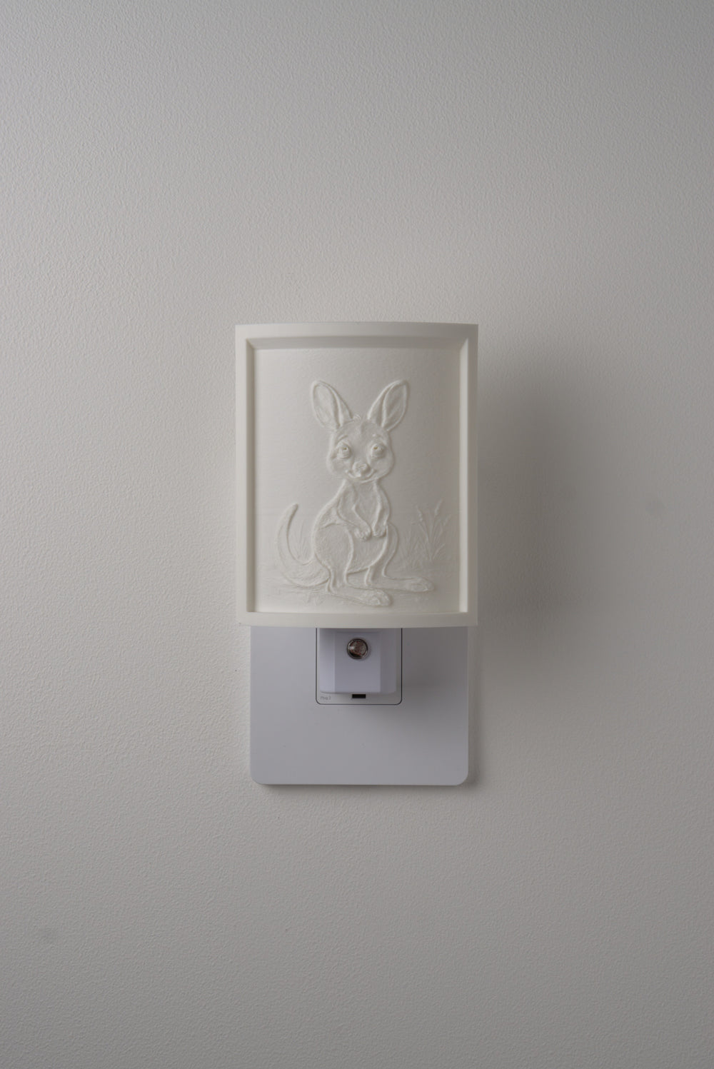 Joey night light switched off — a soft ivory panel by day