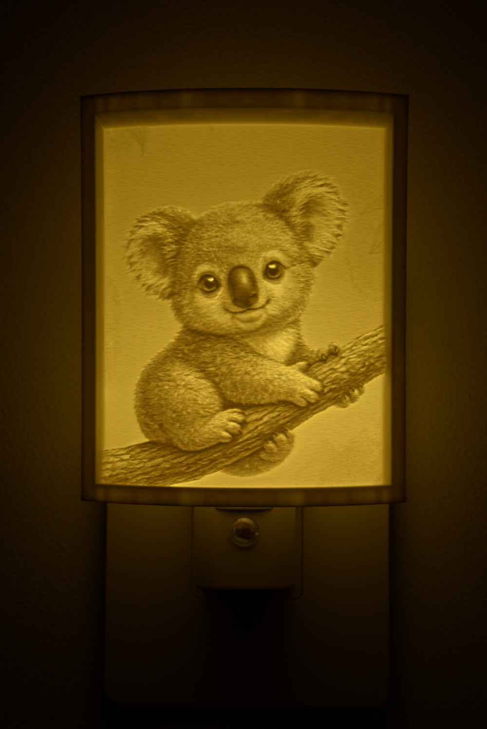 Close-up of the koala design in warm light