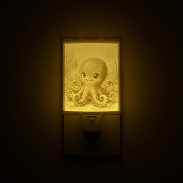 Octopus night light glowing against a dark wall, plugged into an outlet