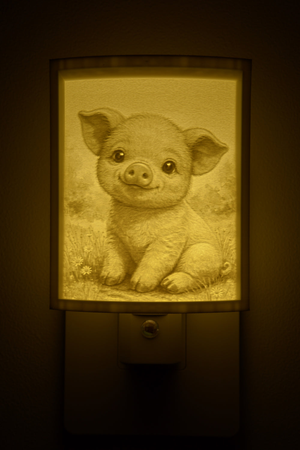 Close-up of the pig design in warm light