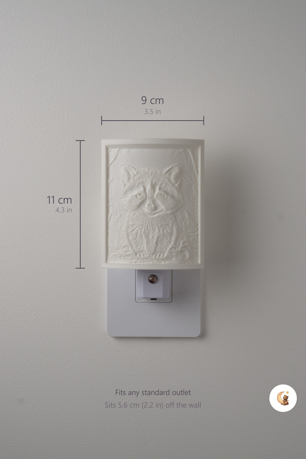 Size guide: the Raccoon night light is 9 cm (3.5 in) wide by 11 cm (4.3 in) tall and fits any standard outlet