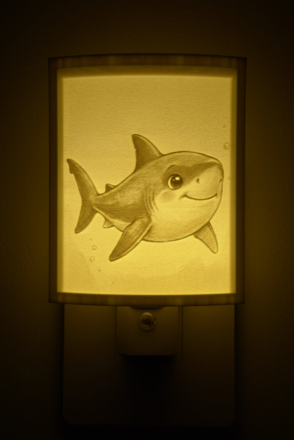 Close-up of the shark design in warm light