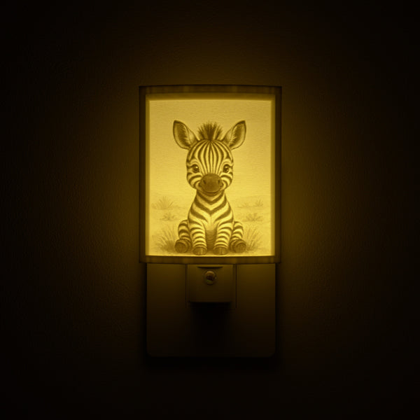 Zebra night light glowing against a dark wall, plugged into an outlet